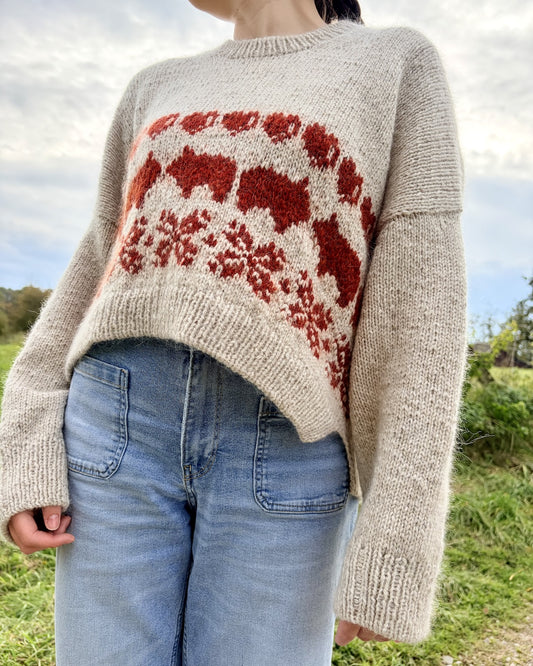 Jouluporsas-neulepusero | rento joulupusero, joka on neulottu Biches & Bûchesin Le Lambswool- ja Le Petit Silk & Mohair -langoista